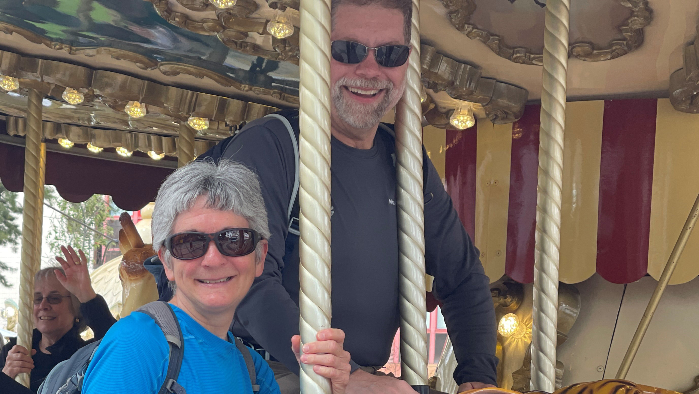 Carla Rossi and her husband on a carousel